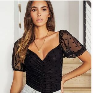 Lulu's_ Black Polka Dot Mesh Ruched Puff Sleeve
Bodysuit Size Small